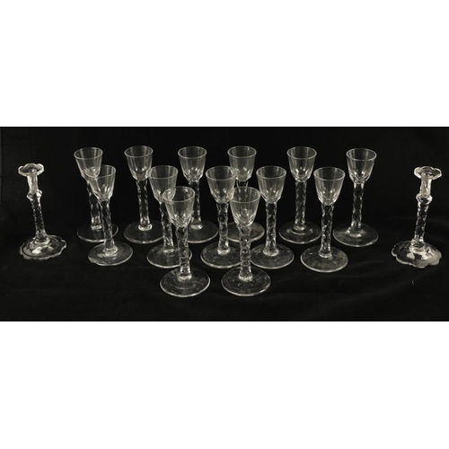 132 - A set of 13 late 18th Century cordial Glasses, each with a bucket bowl on a facet cut stem, 6