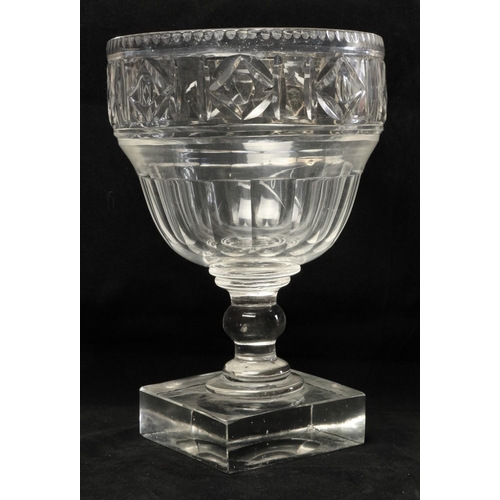 140 - A 19th Century Irish cutglass tall Centre Bowl, with beaded rim, and tapering shape on heavy square ... 