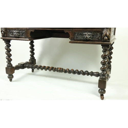 171 - An oak 17th Century style kneehole Desk, profusely carved with scrolling foliage and animal masks on... 