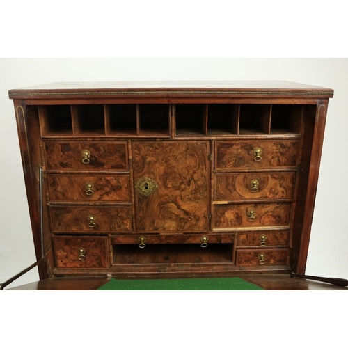 214 - A fine early Regency period brass inlaid walnut and mahogany Bureau Abbatant, the fall front opening... 