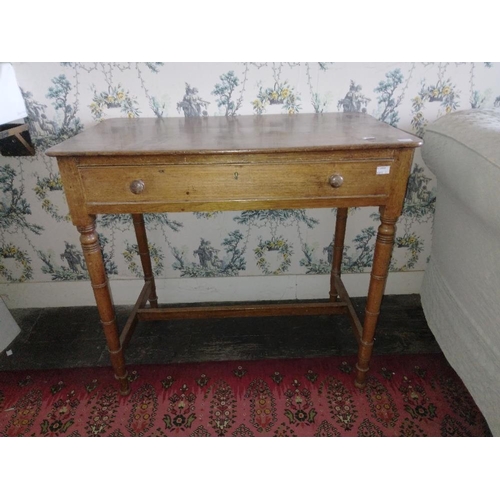 259 - A George IV period mahogany Side Table, with rectangular top and frieze drawer, on ring turned legs,... 