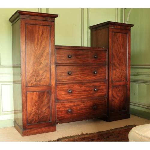 278 - An early Victorian Irish mahogany Wardrobe Chest, the sunken centre with an arrangement of four long... 