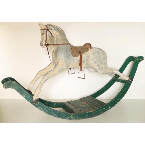 304 - A large Victorian Rocking Horse, painted grey on a green arched base. (1)