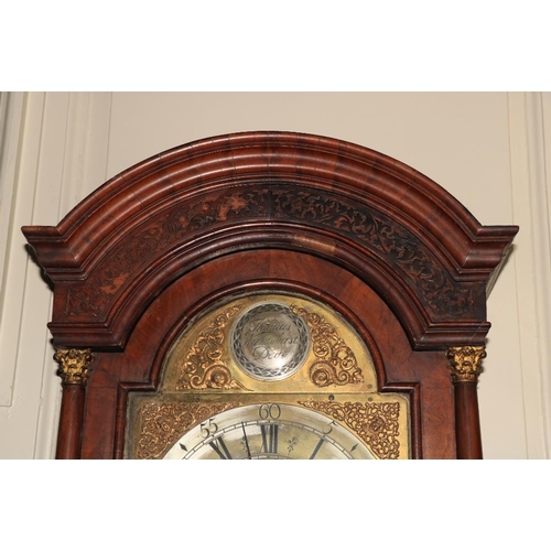 344 - A good quality 18th Century walnut Longcase Clock, with arched blind fret work hood over a brass and... 