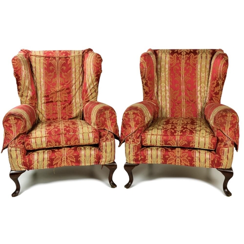 352 - A pair of Georgian style wing back Armchairs, covered in red and green damask fabric with loose cush... 