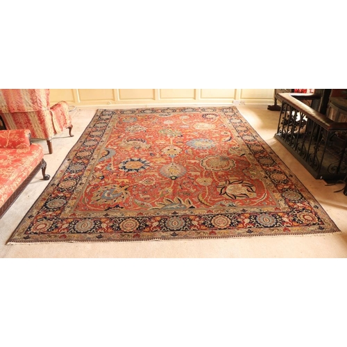 382 - A magnificent Persian polychrome semi-antique Carpet, the red ground profusely decorated with images... 