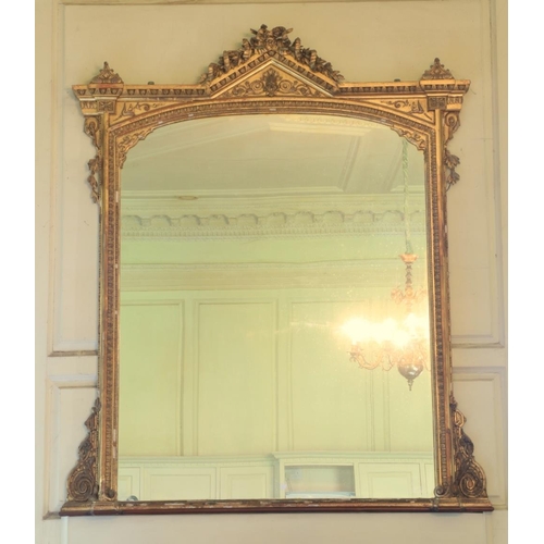 383 - A Victorian gilt and gesso Overmantel, with arched and ribbon crest above a plate mirror with egg n'... 