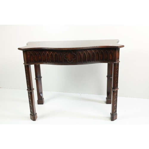 407 - An attractive pair of mahogany Side Tables, attributed to Hicks of Dublin, in the Gothic manner, the... 