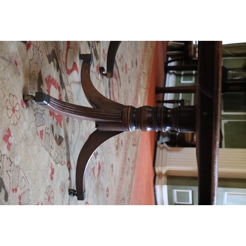 417 - A magnificent Georgian period mahogany Dining Table, on two quadruple centre pods, and two outer tri... 