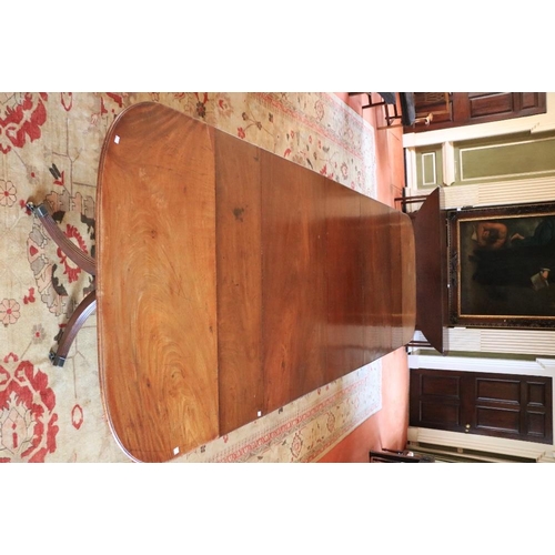 417 - A magnificent Georgian period mahogany Dining Table, on two quadruple centre pods, and two outer tri... 