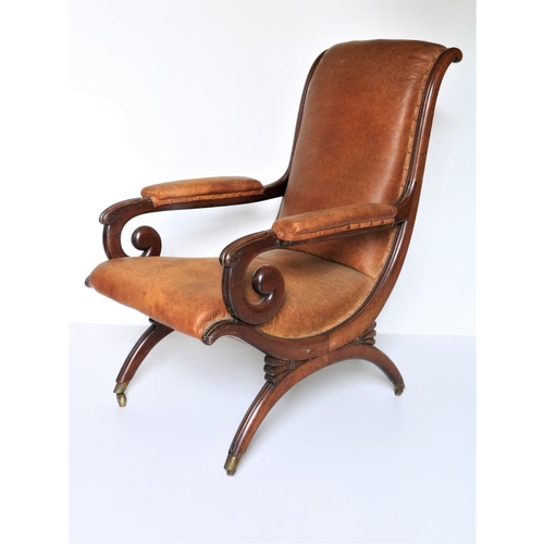 428 - A very fine William IV - X framed mahogany Library Armchair, with recurving seat and back, covered i... 