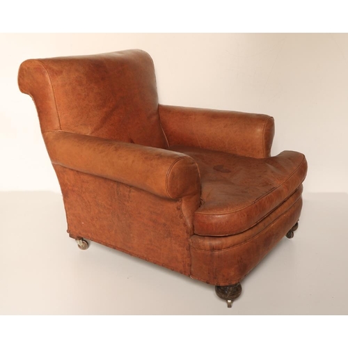 433 - A pair of tan hide covered Club Type Armchairs, in the style of Howard, London, with loose cushion s... 