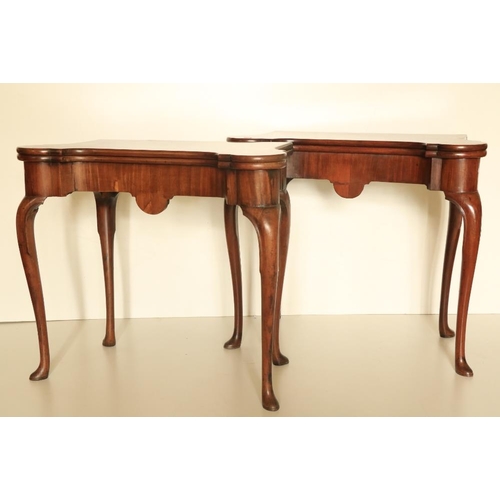 482 - A fine pair of 18th Century red walnut fold-over Card Tables, probably Irish, each with front rounde... 