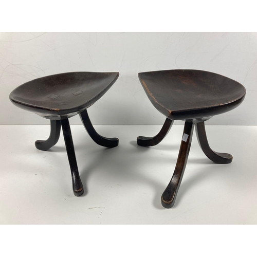 535 - A pair of late 19th Century vernacular three legged 'Theban' Saddle Stools, by Adolf Loos, with unus... 