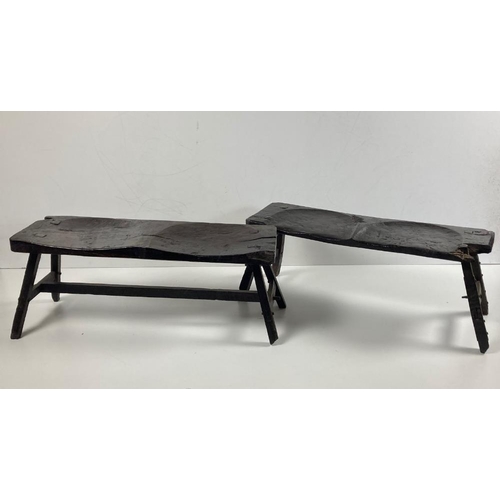 538 - Two important carved plank top double saddle seated Stools, 16th Century and later, on four square l... 