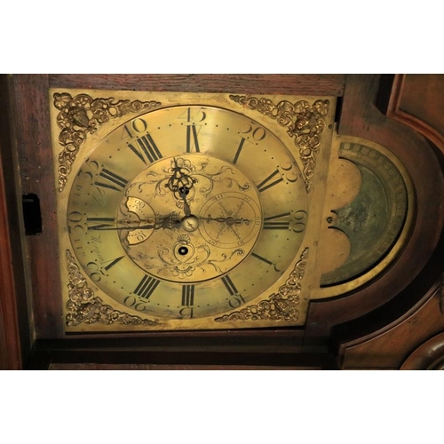 551 - An Irish George III period mahogany Longcase Clock, the brass dial with Roman and Arabic numerals, t... 