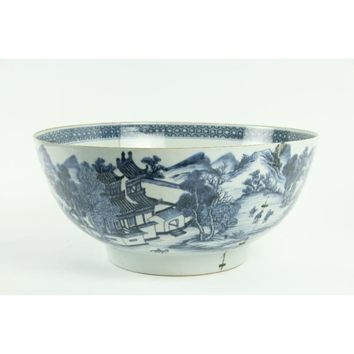 66 - A large blue and white Chinese Qianlong period (1736 - 1795) Punch Bowl, decorated with landscape de... 