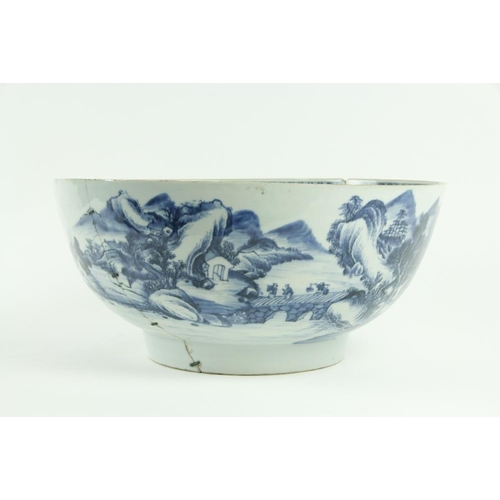 66 - A large blue and white Chinese Qianlong period (1736 - 1795) Punch Bowl, decorated with landscape de... 