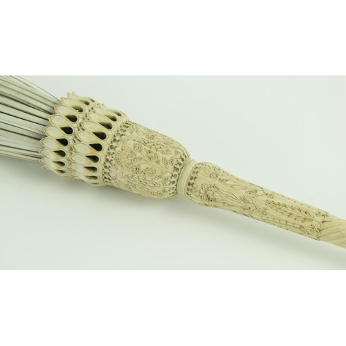 73 - A very fine early 19th Century Indian intricately carved large ivory Fly-Swat, the 37cms (14 1/2