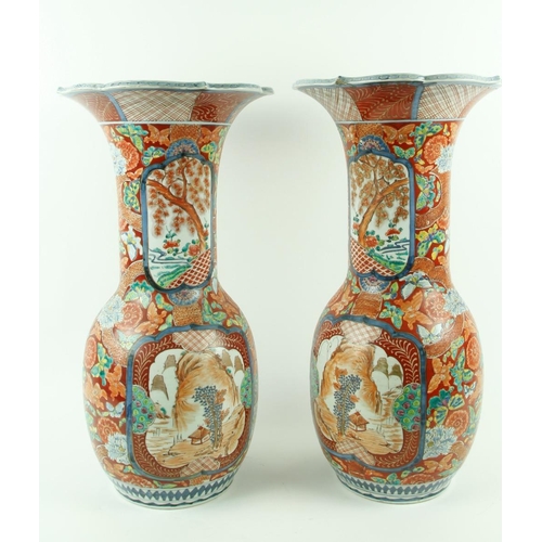 74 - A pair of attractive and heavy 19th Century Japanese porcelain Vases, of flared and bulbous form, th... 