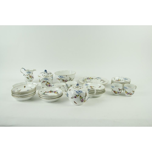 89 - A comprehensive Meissen porcelain Tea & Coffee Service, each piece profusely decorated with colo... 