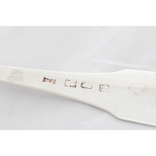 722 - An Irish George III monogrammed silver fiddle pattern Skimming Spoon, by Samuel Neville, Dublin 1801... 