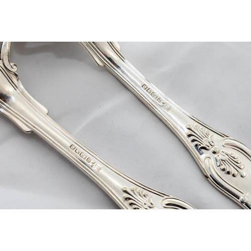 723 - An attractive pair of 19th Century Kings pattern silver plated and crested Fish Servers. (2)... 