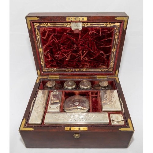 732 - A Victorian brass mounted mahogany Vanity Case, with Bramah lock, the interior fitted with numerous ... 