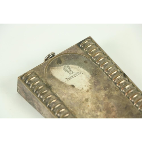 858 - A rare early 19th Century crested and silver plated Door Wedge, with ridged bands and arched centre,... 