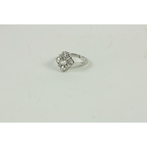 861 - An attractive Ladies diamond Ring, set in platinum, with 8 natural white diamonds (total carat weigh... 