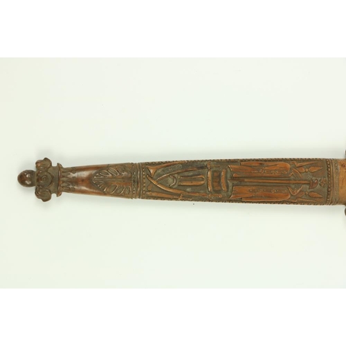 906 - A very rare Ottoman carved walnut Hunting Dagger, the hilt with lion and snake pommel, the grip with... 