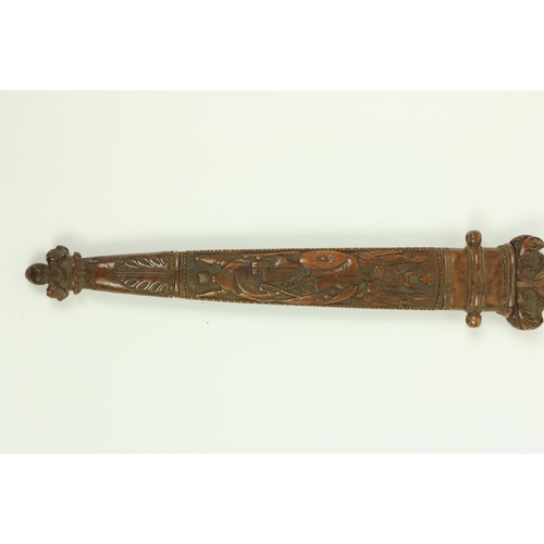 906 - A very rare Ottoman carved walnut Hunting Dagger, the hilt with lion and snake pommel, the grip with... 