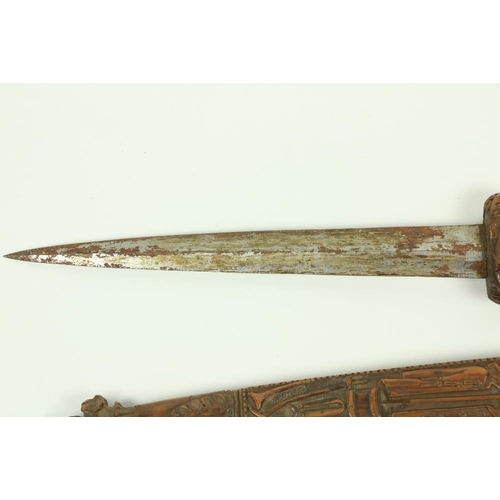 906 - A very rare Ottoman carved walnut Hunting Dagger, the hilt with lion and snake pommel, the grip with... 