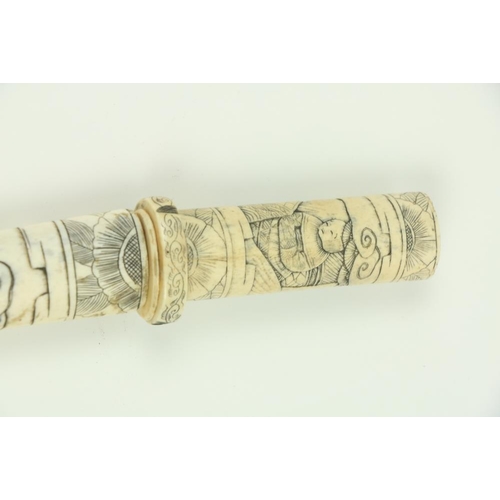 907 - A Japanese carved bone Tanto (Dagger), the scabbard and hilt carved with numerous figures, 17