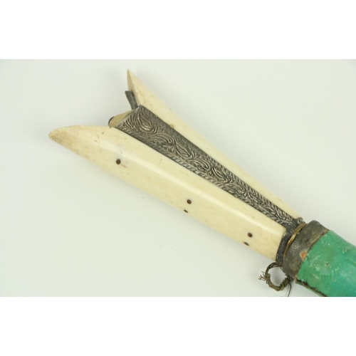 908 - A Persian Kard Dagger, with chased single edge blade with feather back 16