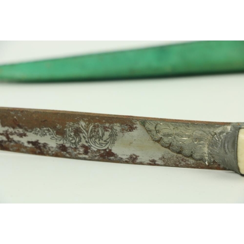 908 - A Persian Kard Dagger, with chased single edge blade with feather back 16