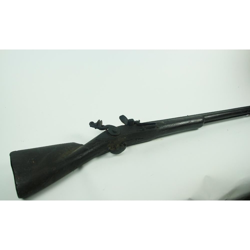 935 - A very large late 18th Century / early 19th Century flintlock Punt Gun, with iron lock butt cap and ... 