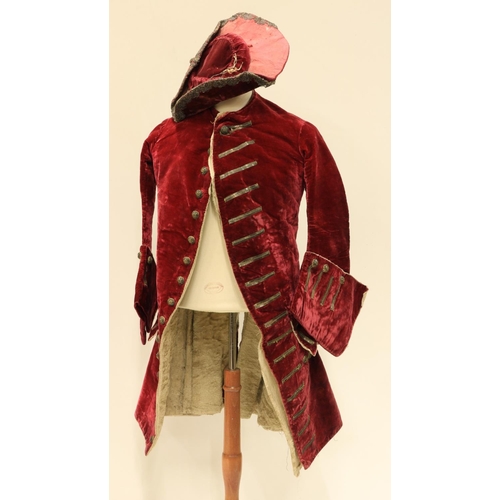 947 - A rare late 18th Century dark red velvet Gentleman's Jacket, lined with fur and felt, two flap over ... 