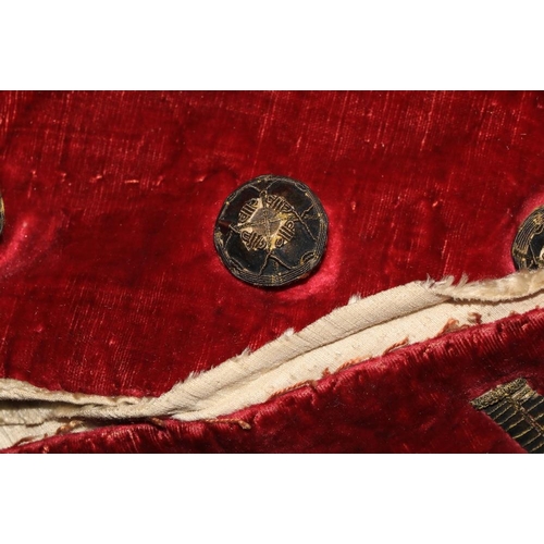 947 - A rare late 18th Century dark red velvet Gentleman's Jacket, lined with fur and felt, two flap over ... 