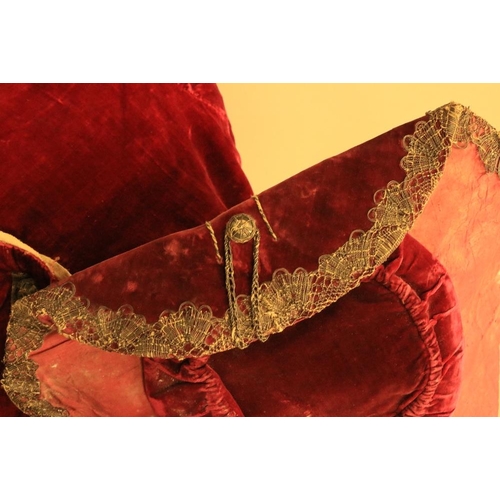 947 - A rare late 18th Century dark red velvet Gentleman's Jacket, lined with fur and felt, two flap over ... 