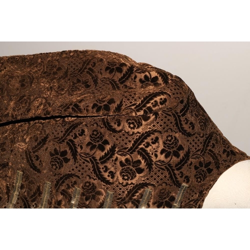 948 - A late 18th Century silk brocade brown Gentleman's Coat, with all over floral pattern, two side pock... 