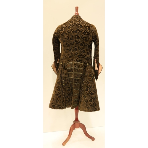 948 - A late 18th Century silk brocade brown Gentleman's Coat, with all over floral pattern, two side pock... 