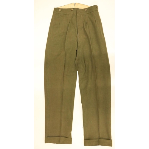 954 - Two green Khaki British Army Uniforms, by Peal & Co., London, early to mid - 20th Century; three... 