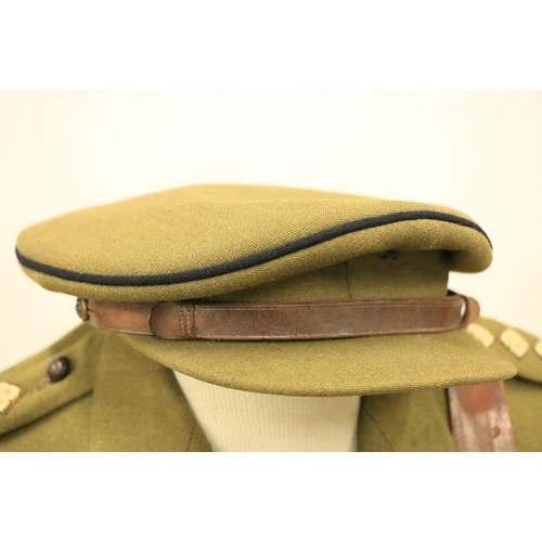 954 - Two green Khaki British Army Uniforms, by Peal & Co., London, early to mid - 20th Century; three... 