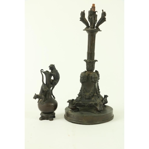 819 - A 19th Century cut bronze Centrepiece, the square flared base with grotesque masks united by fruit s... 