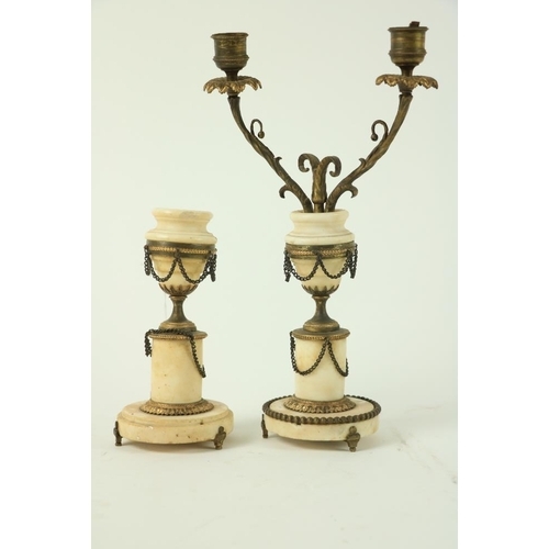 841 - A pair of Regency bronze and gilt bronze Candlesticks, each with an urn socket above hanging vine le... 