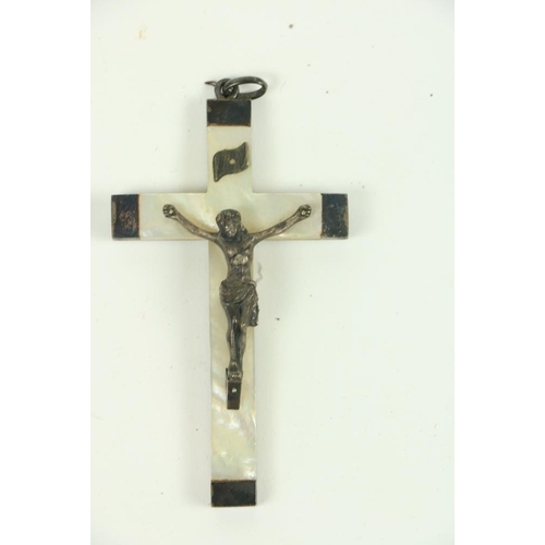 888 - A small mother-o-pearl and silver Crucifix, in arched leather table case, another large late Victori... 