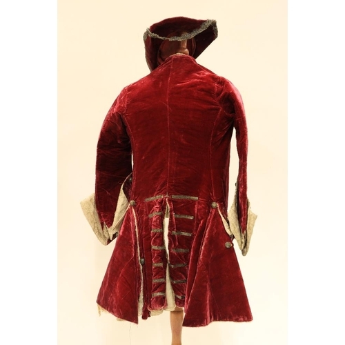 947 - A rare late 18th Century dark red velvet Gentleman's Jacket, lined with fur and felt, two flap over ... 