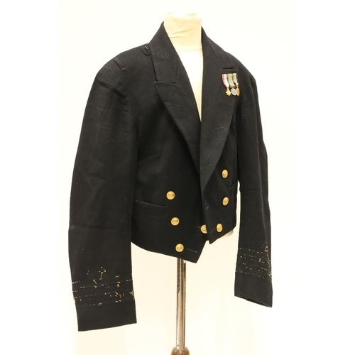 953 - A Royal Navy Officer's Uniform, with overcoat, jacket, pair of trousers, mess jacket, a pair of epau... 