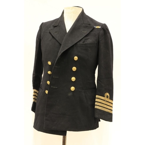 953 - A Royal Navy Officer's Uniform, with overcoat, jacket, pair of trousers, mess jacket, a pair of epau... 